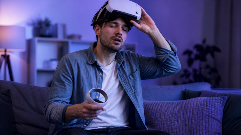 Person pausing a VR session and adjusting a headset after feeling dizzy